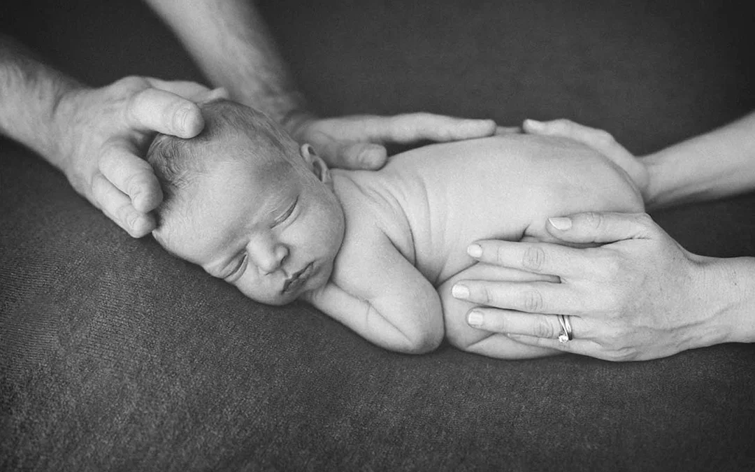 Perché le foto di neonati si fanno da addormentati?